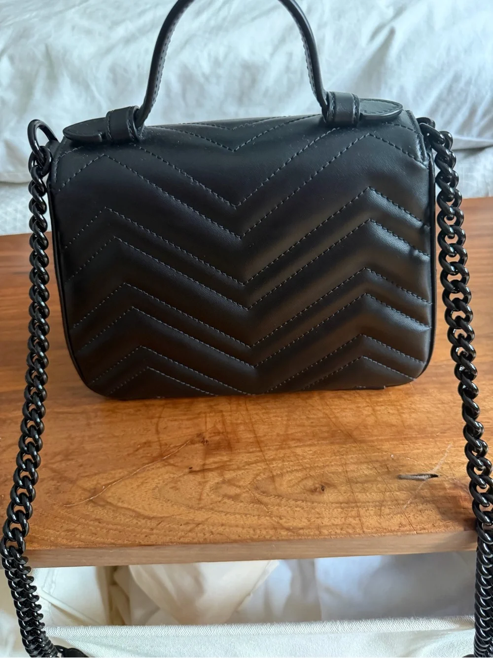 GG Marmont Mini Black Quilted Top-Handle Women’s Bag with Interlocking Logo